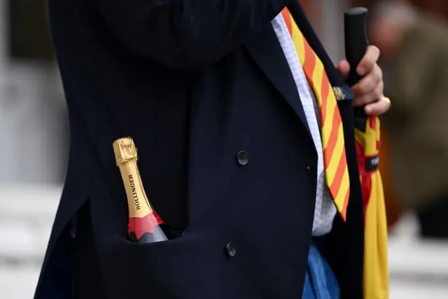 A bottle of champagne in the jacket pocket of an MCC member at Lord's last month
