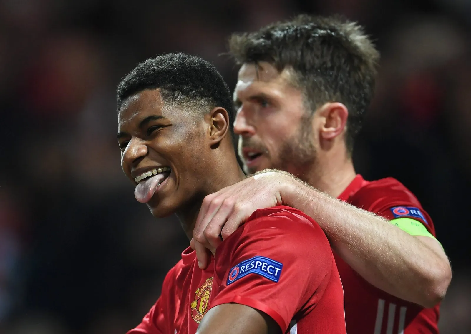 MANCHESTER, ENGLAND - APRIL 20: Marcus Rashford of Manchester United celebrates with team mate Michael Carrick as he scores their second goal during the UEFA Europa League quarter final second leg match between Manchester United and RSC Anderlecht at Old Trafford on April 20, 2017 in Manchester, United Kingdom. (Photo by Laurence Griffiths/Getty Images)